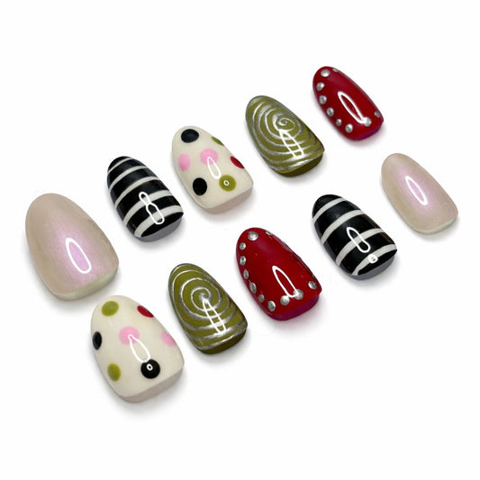 Set of stylized nail art designs on a white background